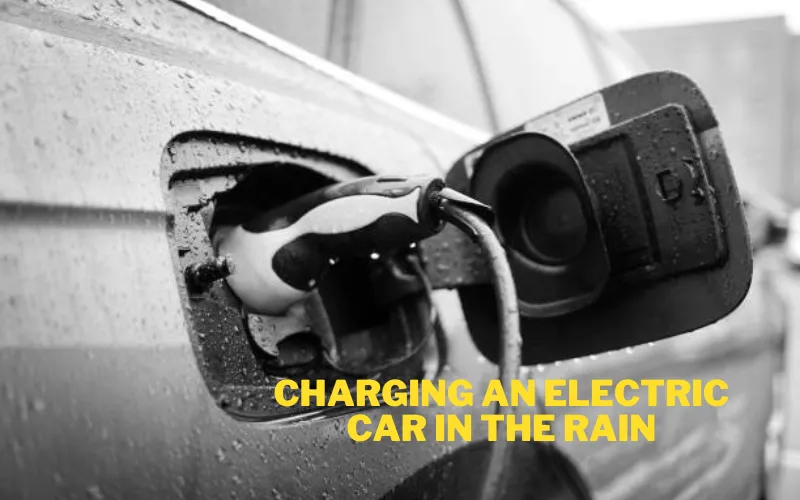 Charging An Electric Car in The Rain
